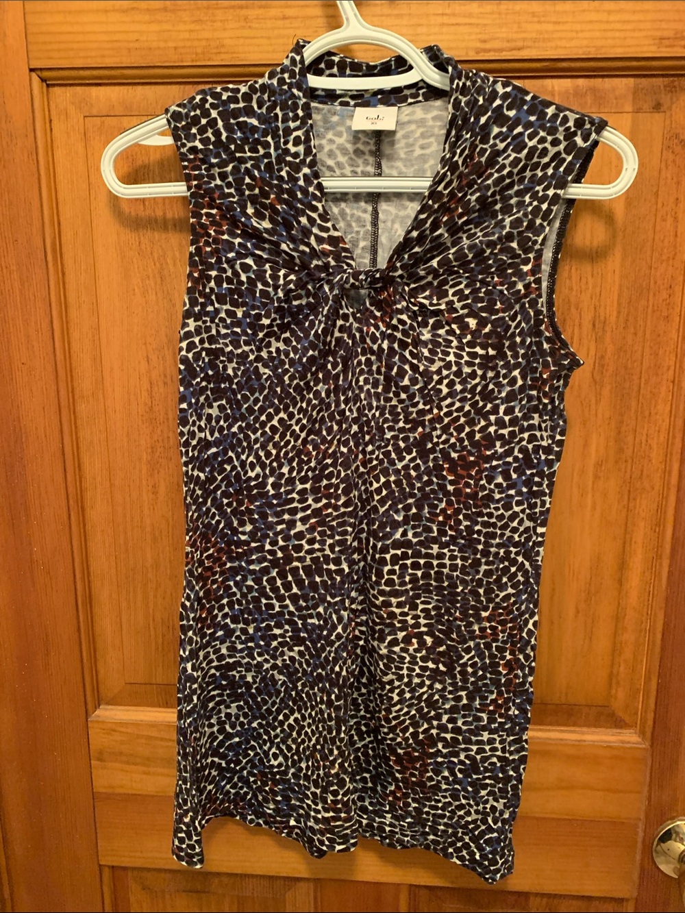 CAbi Sleeveless Twist-Neck Blouse in Navy, Brown & Cream